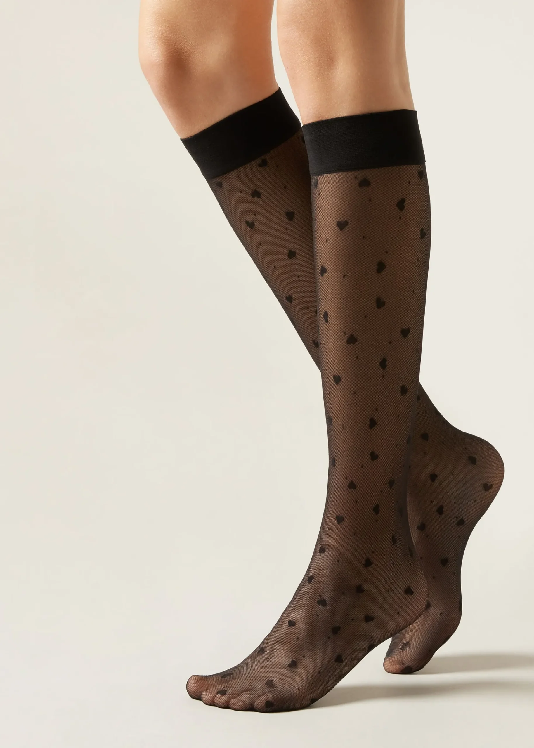 Chaussettes hautes à motifs cœurs et pois