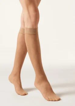 Chaussettes hautes transparentes à motif losanges