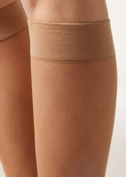 Chaussettes hautes transparentes à motif losanges
