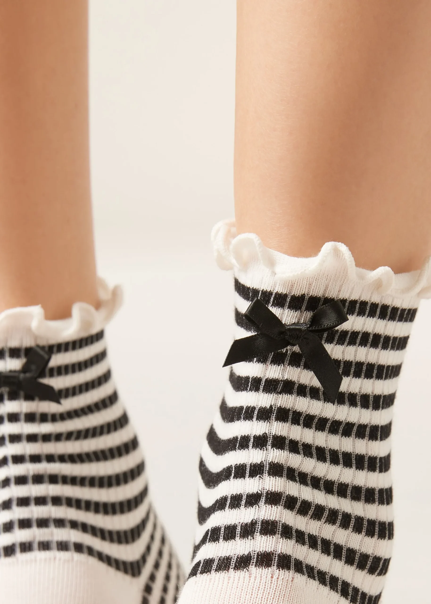 Chaussettes à rayures et nœud